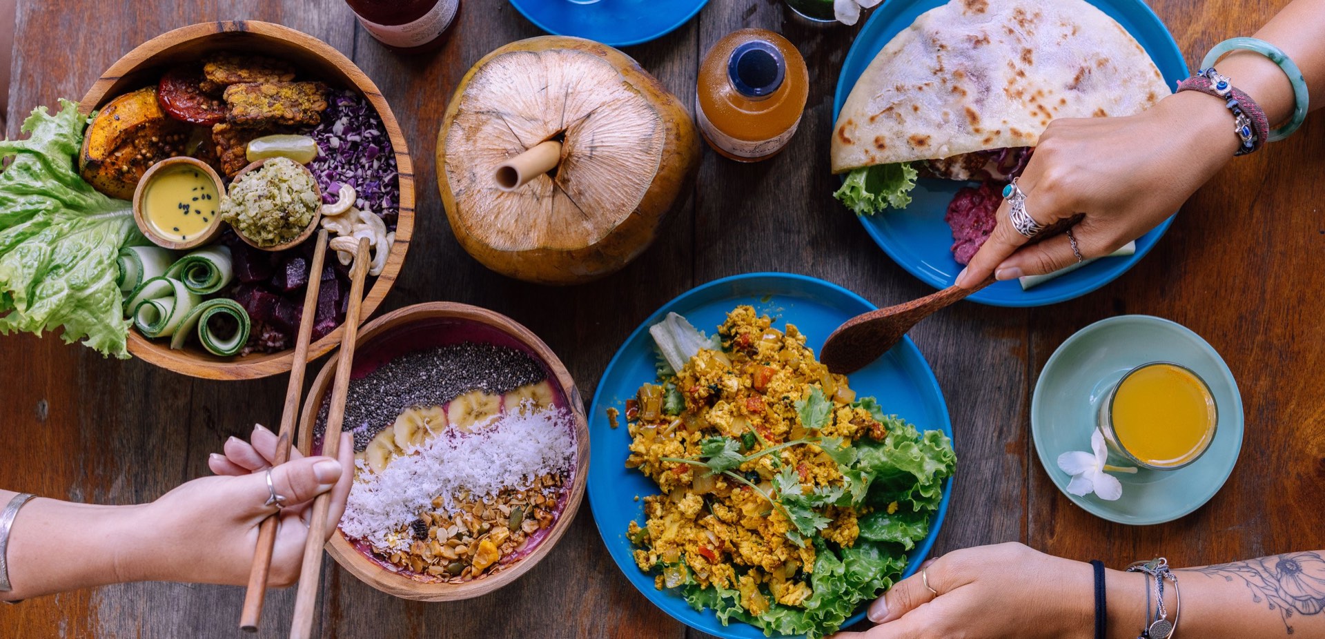 A spread of ROOTS dishes shared at the table